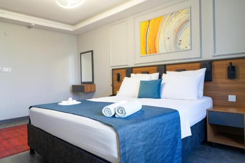 GRAND MOON HOTELにあるベッド