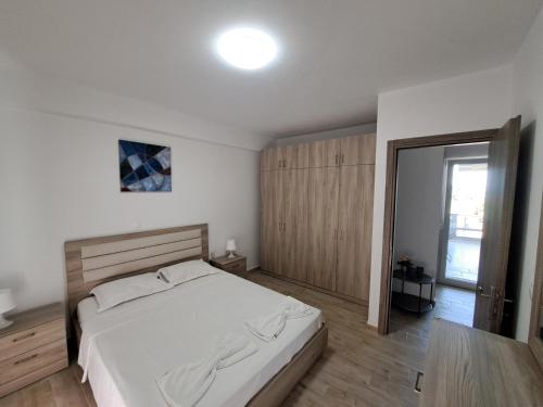 A bed or beds in a room at SYKA Thassos - Villa 4 Rooms SKALA RACHONIOU
