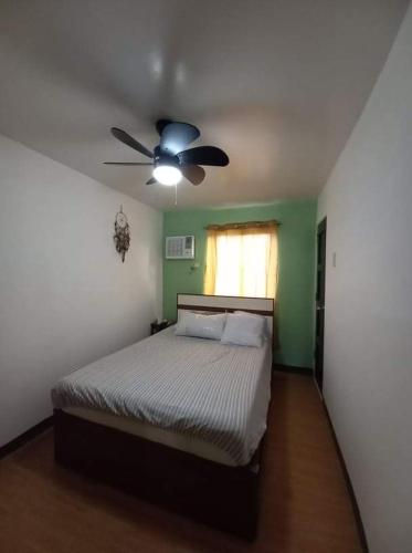 Llit o llits en una habitació de Jb Place Hernan