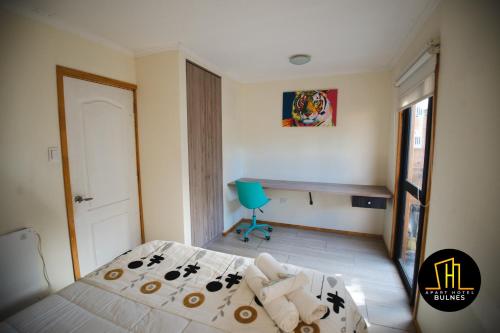 Postel nebo postele na pokoji v ubytování APART HOTEL EN BULNES
