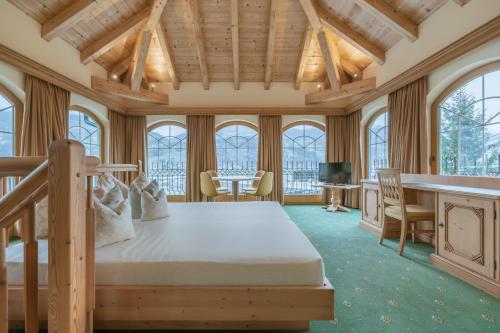 Postel nebo postele na pokoji v ubytování KERSCHDORFER - wohlfühlhotel garni - adults only