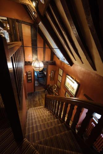 an overhead view of a staircase in a house at 5 bedroom Manor with idyllic countryside views in Croxton Kerrial
