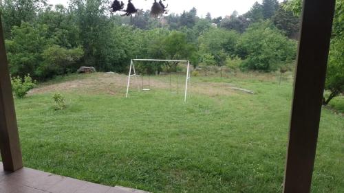 En have udenfor El Campito casa frente al río