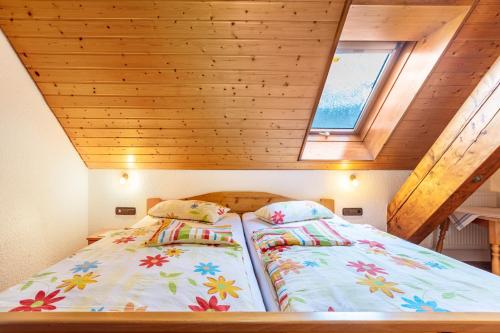 Postel nebo postele na pokoji v ubytování Haus Am Kreuzbühl