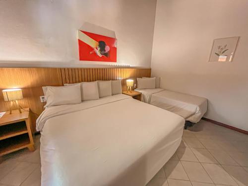 Katil atau katil-katil dalam bilik di Mar Paraíso Hotel