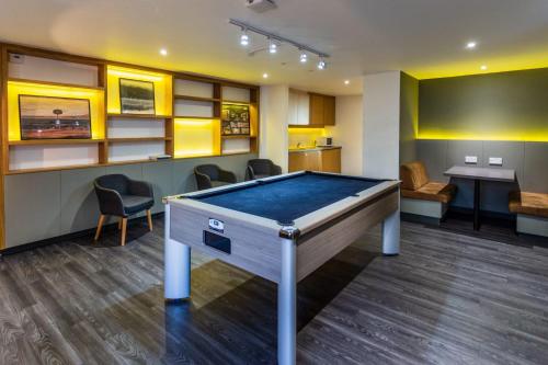 a room with a pool table in a room at For Student Only Trinity Square in Nottingham in Nottingham