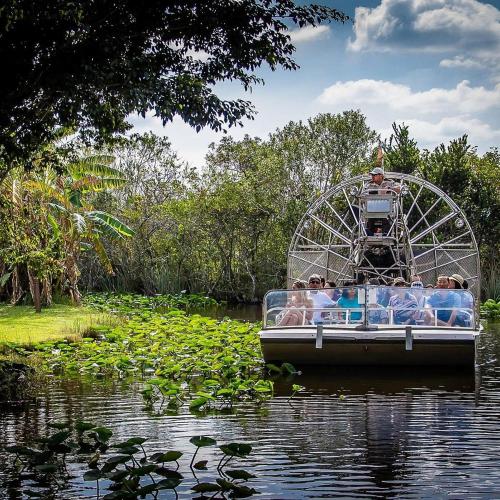 a group of people riding a ride on a boat in the water at Family Favorite- Heated Pool, 2 Kings, Everglades in Homestead