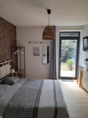 Postel nebo postele na pokoji v ubytování Chambre d'Hôtes Ty Men