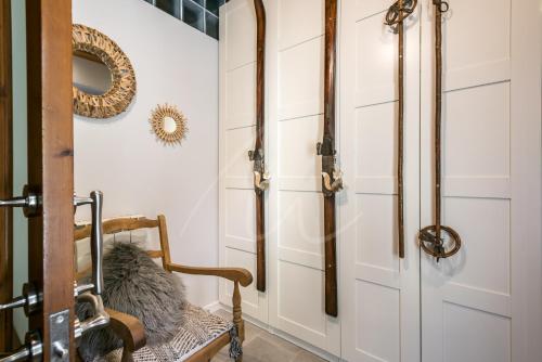 a room with a closet and a door at Casa Molières by SeaMount Rentals in Unha