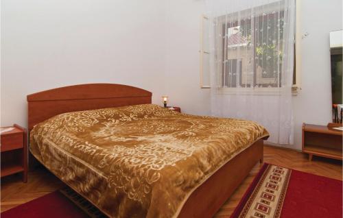 Postel nebo postele na pokoji v ubytování Apartment Supetar 49