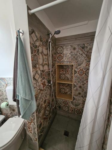 Ванная комната в Pietra su Pietra Casa Vacanze