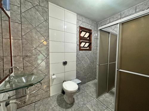 Koupelna v ubytování 03 - Casa praia pinheira perto da guarda