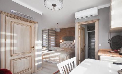 a room with a bedroom with a bed in it at Galatolia Apart Hotel in Istanbul
