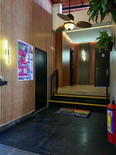 a hallway of a building with a elevator and a door at Spartacus hostel boutique for men in Puerto Vallarta