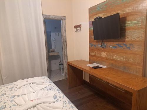 TV a/nebo společenská místnost v ubytování Pousada Encanto da Serra