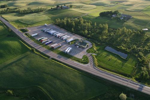 an aerial view of a parking lot with boats at Zajazd Żubryn in Zubryn