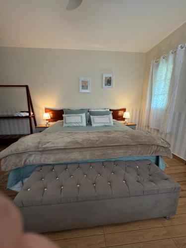 Postel nebo postele na pokoji v ubytování Pousada Casa Primitivus