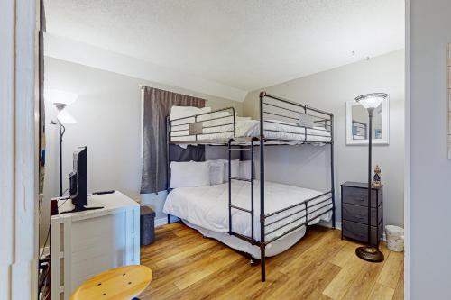 Ένα ή περισσότερα κρεβάτια σε δωμάτιο στο Myrtle Beach Resort B-446