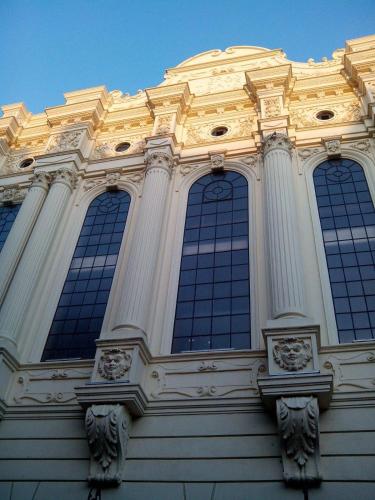a building with four windows on top of it at Apartamento Cortelazor in Huelva