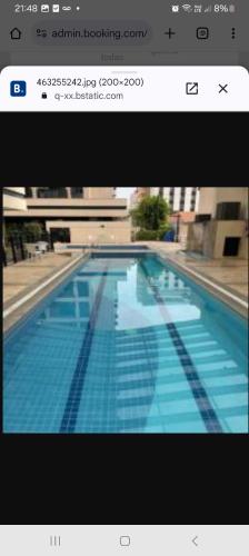 a picture of a swimming pool on a computer screen at Suitel Espetacular aeroporto Congonhas in Sao Paulo