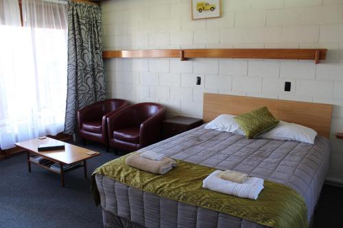 Кровать или кровати в номере Elmore Lodge Motel