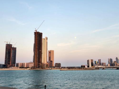 a view of a city from the water at 3-BR Sea View Duplex on Island in Sanābis