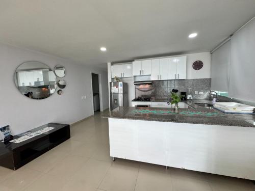 Kuchyň nebo kuchyňský kout v ubytování Regency Suites Morros by Parceros Group