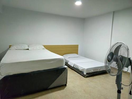 Ένα ή περισσότερα κρεβάτια σε δωμάτιο στο Denier House Guabinal 203