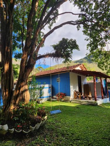 Taman di luar Chalé Trilha do Tatú