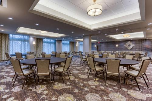 a large banquet room with tables and chairs at Drury Inn & Suites Cleveland Beachwood in Beachwood
