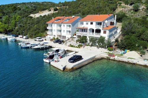 an aerial view of a marina with boats in the water at Double Room Zaglav 8144d in Zaglav