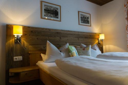 A bed or beds in a room at Rusticana