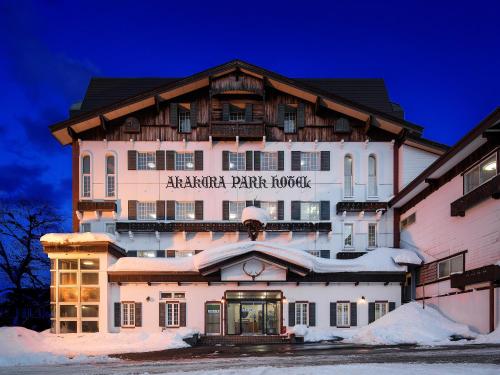 a large building with a sign on it at Yunoyado Mochizuki in Myoko