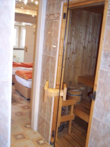 Ένα ή περισσότερα κρεβάτια σε δωμάτιο στο Hotel Tenne