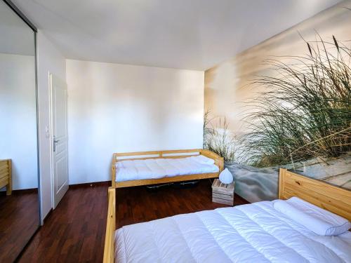 T3 76m² avec terrasse, balcon, à 100m de la plage d'Eyrac, parking et WIFI