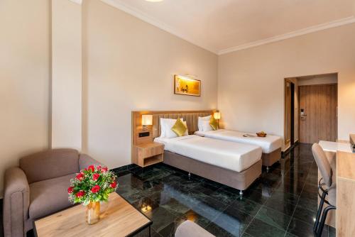 Katil atau katil-katil dalam bilik di Hotel Vishnupriya