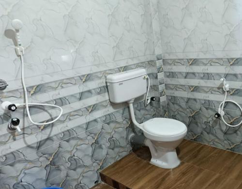 Ένα μπάνιο στο Anuj Homestay By StayApart