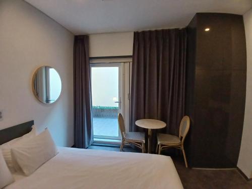 Hotel Firststay Hongdaeにあるベッド