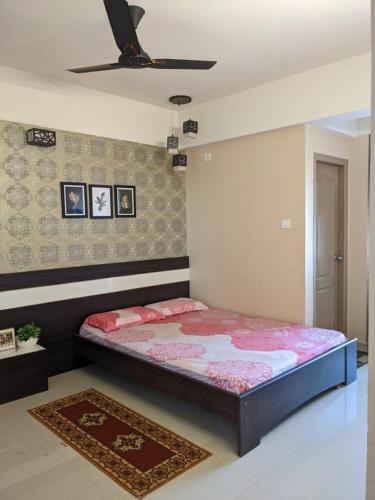 Postel nebo postele na pokoji v ubytování BEST Serviced Apartments at Technopark & TCS