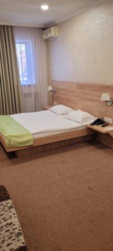 レニオン ホテルにあるベッド