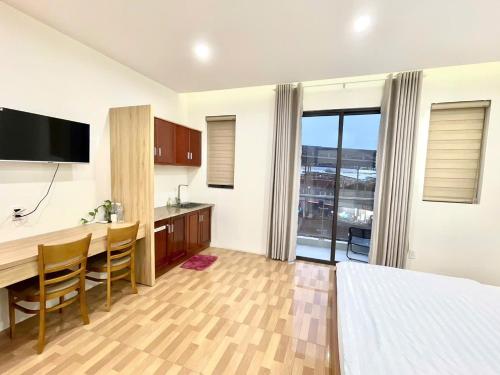 TV a/nebo společenská místnost v ubytování Hotel KAMI 1