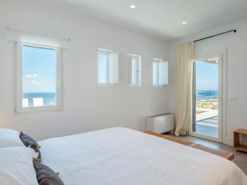 Postel nebo postele na pokoji v ubytování Templo y Mar IV by Mykonos Mood