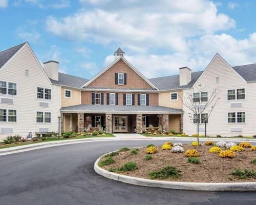 a large white house with a road in front of it at Bluegreen Vacations Shenandoah Crossing, an Ascend Collection Resort in Gordonsville