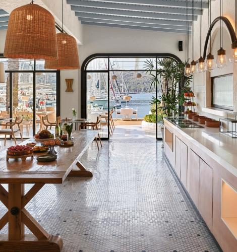 a kitchen with a table with food on it at Yacht Classic Hotel - Boutique Class in Fethiye