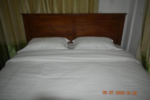 Katil atau katil-katil dalam bilik di FOUR-G Home Stay & Komodo Tour