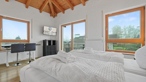 Katil atau katil-katil dalam bilik di Cozystays