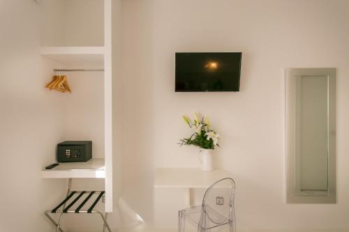 TV o dispositivi per l'intrattenimento presso Hostal Met Madrid