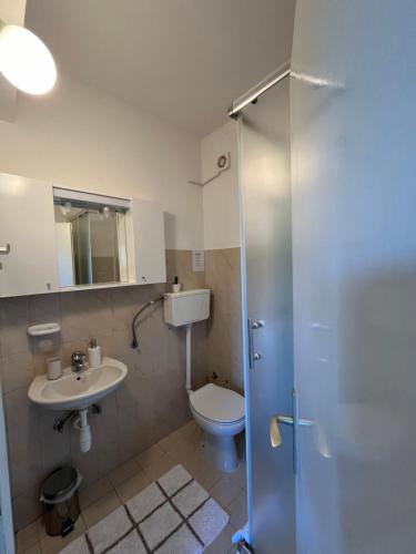 Un baño de Apartmani Ivan