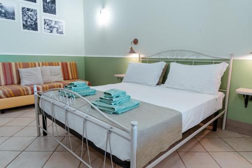 Кровать или кровати в номере Agriturismo Tenuta Carrino