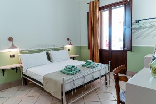 Кровать или кровати в номере Agriturismo Tenuta Carrino